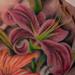 Tattoos - Lilies and Hibiscus flowers on ribs - 59655